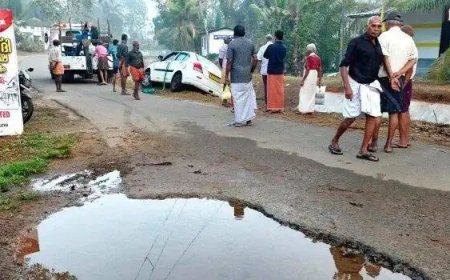 റോഡിലെ കുഴി : കാര്‍ കനാലിന്റെ തിട്ടയിലിടിച്ച്‌ നിന്നു